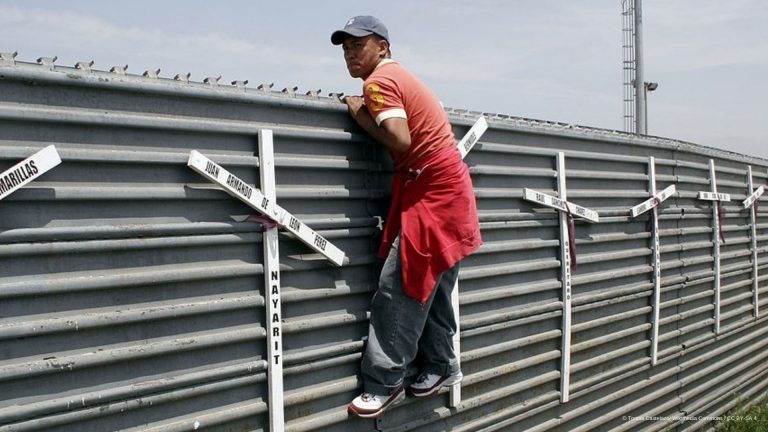 An Immigrant Looking Across The Wall 768X432